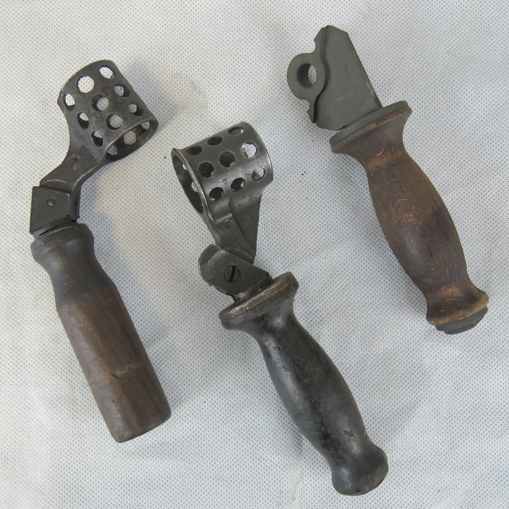 Two Bren carry handles and an AA handle.