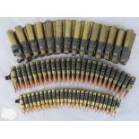 Three assorted bullet belts, .50 cal, .556, and .762.