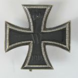 A very fine quality reproduction WW1 German Iron Cross first class; stamped "Ges. Gesch" verso.