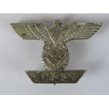 A fine quality reproduction WW2 Nazi German Iron cross bar in white metal; stamped "L/22" verso;