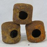 Three German WWII Butterfly bomb cases.