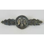 A Nazi Luftwaffe short range night fighter style metal clasp; with no markings verso; 7.5cm wide.