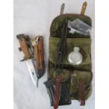 An AK bayonet and mag pouch.