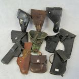 Ten assorted holsters including a WWII German example