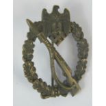 A good quality reproduction Nazi infantry assault badge; 6cm long.