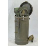 A WWII German gas mask, can dated 1937.