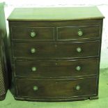 A mahogany bow front chest of drawers, in two sections; a/f.
