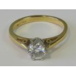 An 18ct gold and diamond solitaire ring,