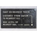 A cast iron vintage railway sign 'cant on nearest track...distance from datum to nearest R.E..