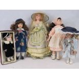 Five late 20th century dolls, all with bisque heads; smallest 26cm high largest 40cm high.