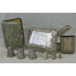 A quantity of assorted thimbles together with a plated vesta case,