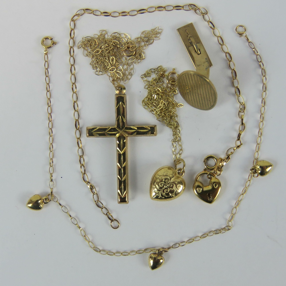 A quantity of 9ct gold and yellow metal; a yellow metal cross on 9ct gold fine chain,