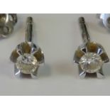 A pair of 18ct white gold and diamond stud earrings, 0.