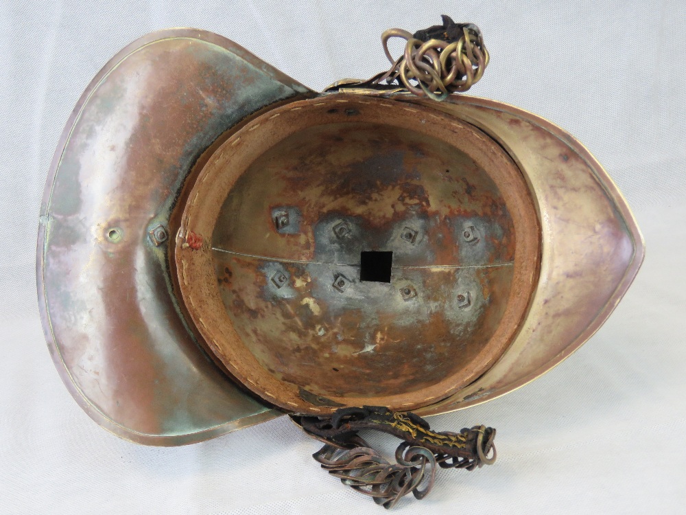 A vintage London Fire Brigade brass firemans helmet, marked LCC LFB upon, - Image 2 of 2