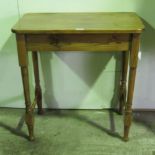 A single polished pine square shaped occasional table raised over turned legs 72cm wide.