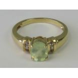 A 9ct gold quartz and diamond ring,