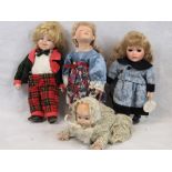 Four late 20th century dolls all with bisque heads: including a crawling baby; all unboxed; a/f.