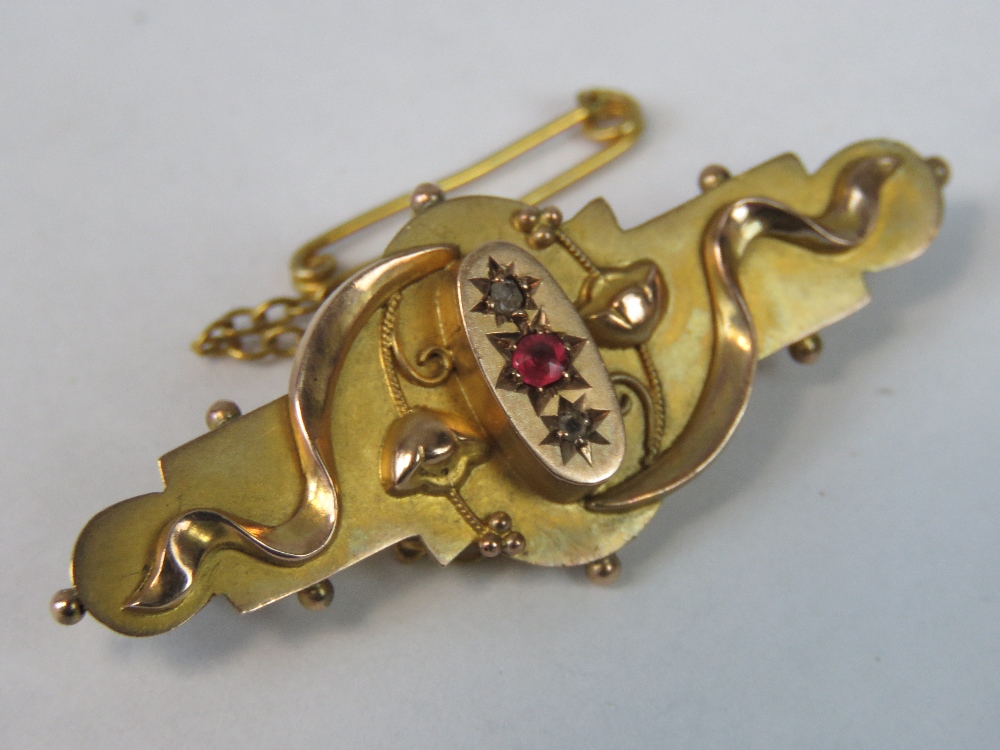 A 9ct gold ruby and diamond brooch,