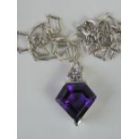 A handmade 18ct white gold diamond amethyst and diamond pendant on 18ct white gold chain,