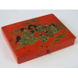 An early 20thC Japanese papier mache lidded case opening to reveal compartments within, 13.