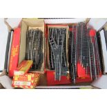 A collection of vintage Tri-ang model railway part sets HO/OO track, some with boxes.