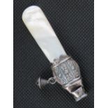 A HM silver and mother of pearl whistle, Birmingham 1898, made by E S Barnsley & Co Ltd, 8cm.