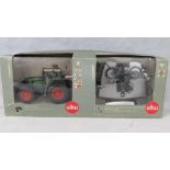 A Siku remote control 1:32 scale model Feindt 930 tractor with original box and controller; a/f.