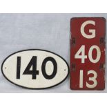 Two original cast metal railway signs.