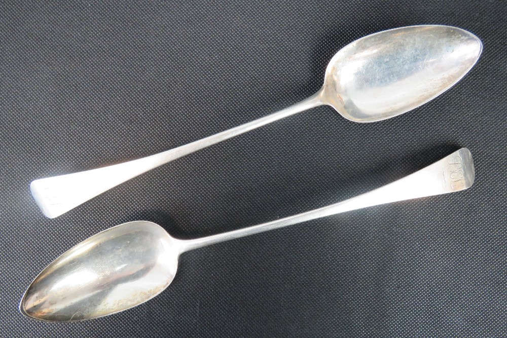 A large pair of Georgian HM silver serving spoons, London 1818, maker Susanna Peppin, 30.