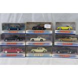 Nine boxed Dinky commercial vehicles and vintage cars.