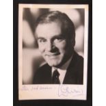 A Laurence Olivier black and white publicity photograph signed lower 'All good wishes, L Olivier.