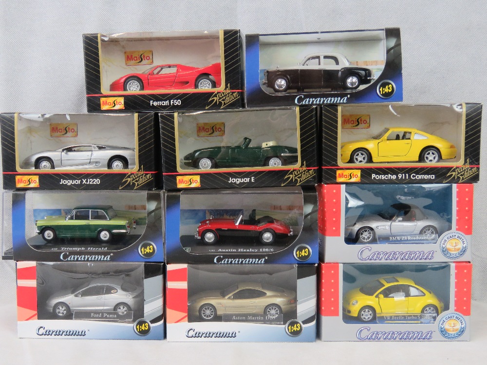 Four Miesto boxed special edition cars, seven Cararama boxed cars.