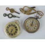 A silver open face pocket watch with applied yellow metal decoration and Roman numerals,