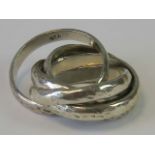 A silver Russian style interlocking bands ring, stamped 925, size L, 16g.