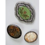 Vintage brooches; a cameo with floral carving and 800 silver frame set with marcasites,