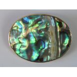 A 9ct gold mounted abalone shell brooch, hallmarked 375, 4cm wide, 7.