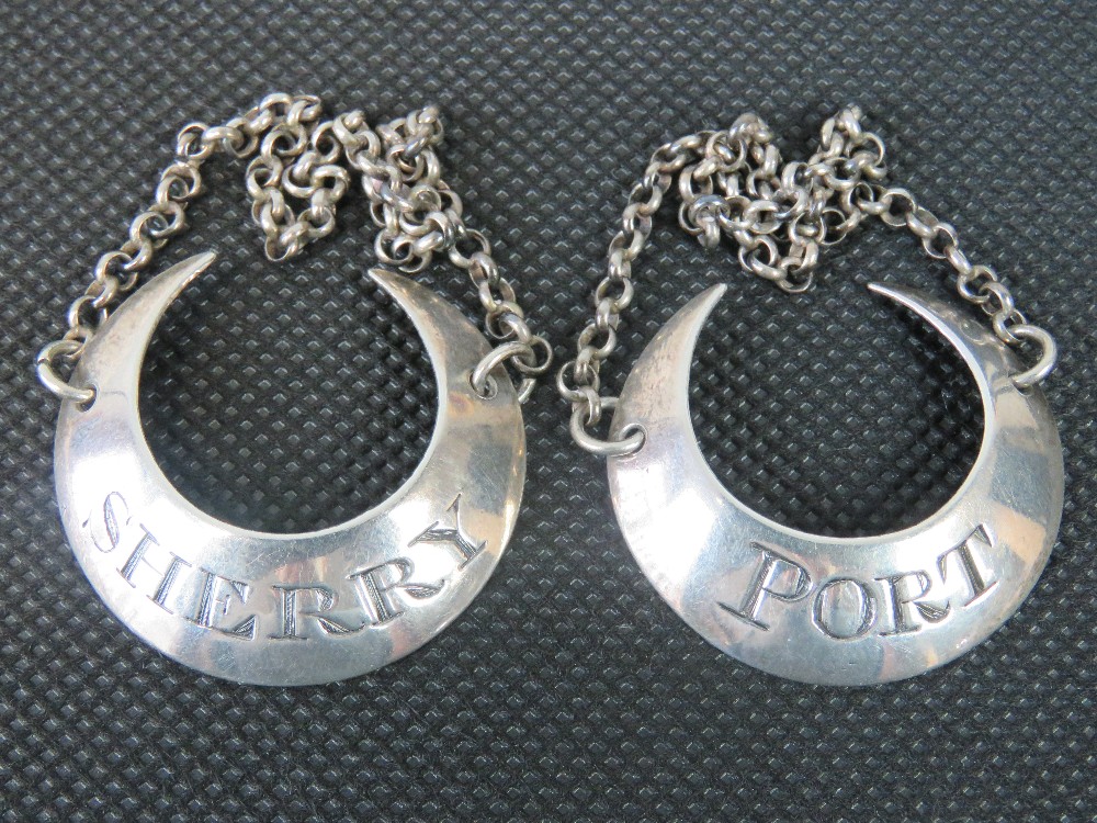 A pair of Georgian HM silver decanter labels for Port and Sherry,