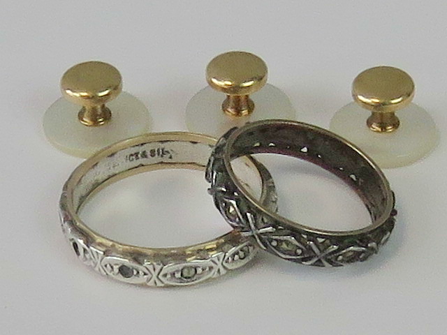 Two 9ct gold and silver eternity rings, each set with white stones,