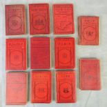 Eleven vintage cloth bound volumes of Ward Lock CO's Illustrated motoring guide books C1929.