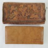 Two vintage leather wallets, one hand tooled with acorn and oak leaf design, no makers name,
