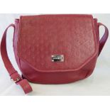 Patrick Cox; as new cross body handbag in burgundy leather, 27.5cm wide.