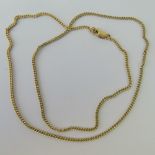 A 9ct gold curb link chain, stamped 9k, 46cm long, 4.