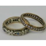 A 9ct gold eternity ring set with blue and white stones (one stone deficient), stamped 375, size K,