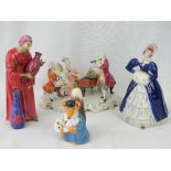 Three continental style figurines together with a Coalport Brazil Brush figurine (11cm high).