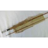 A vintage Hardy Bros two piece split cane fly fishing rod 'The Knockabout', 9ft 6" long.
