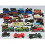 Over twenty vintage die-cast metal and plastic model cars and railway vehicles with some by
