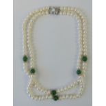 A superb vintage double-row of cultured pearls in the Art Deco style having .