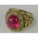 A 9ct gold Cambridge University class ring with with science and arts carved design and large