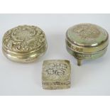 Three HM silver ladies dressing table pots; one with three feet,