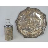 A HM silver bottle sleeve with repoussé depiction of cherubs, 1.